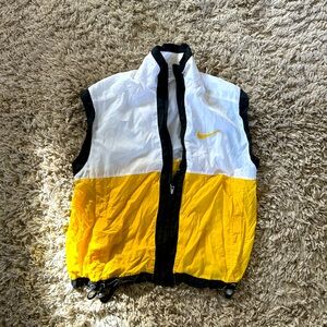 Vintage Nike vest, rubber Nike logo in the back